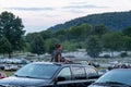 Kids on Car Roof Waiting for Fireworks Show to Start