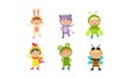 Kids in carnival costumes set, cute little boys and girls wearing insects and animals clothes vector Illustration on a Royalty Free Stock Photo