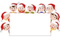 Kids cartoon with a blank sign and christmas hats Royalty Free Stock Photo