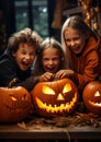 Kids carving pumpkins with big smiles as they scoop out the gooey insides halloween frame Royalty Free Stock Photo