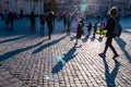 Kids catching and blowing soap bubbles flying on Piazza del Popolo, People Square in Rome full of people, tourists and locals with