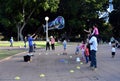 Kids catching and having fun and with soap bubbles