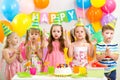 Kids celebrating birthday party Royalty Free Stock Photo