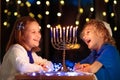 Kids celebrating Hanukkah. Festival of lights