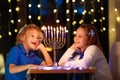 Kids celebrating Hanukkah. Festival of lights Royalty Free Stock Photo