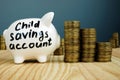 Kids or child savings account written on piggy bank Royalty Free Stock Photo