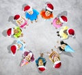 Kids with christmas hats in grey background Royalty Free Stock Photo