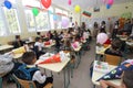 Kids in classroom in primary school for First day of school on September 15, 2021