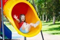 Kids on playground. Children play in summer park. Royalty Free Stock Photo