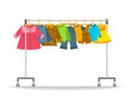 Kids clothes hanging on hanger rack Royalty Free Stock Photo