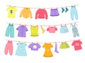 Kids clothes rope. Childish color dresses, sweaters, trousers and skirts clotheslines dried, washed boys and girls clean Royalty Free Stock Photo