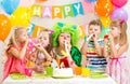 Kids and clown celebrate birthday party Royalty Free Stock Photo