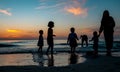 Kids collecting sea shells during sunset at beach