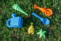 Kids colorful sand toys , shovel, star, palm molds Put on the l Royalty Free Stock Photo