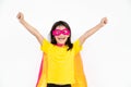 Kids concept, smiling girl playing super hero on white background Royalty Free Stock Photo