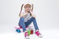 Kids Concepts. Portrait of Little Caucasian Blond Girl in Visor