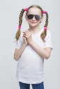 Kids Concepts. Portrait of Positive Caucasian Blond Girl With Pigtails