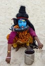 Kids costume fency dress of lord shiva at Varanasi ganga ghat blue face Royalty Free Stock Photo