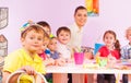 Kids on craft class with mates and teacher Royalty Free Stock Photo