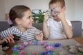 Kids create Easter flower wreath in pastel colors using an upcycled egg trail. Zero waste lifestyle