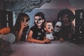 Kids in creepy Halloween costumes Royalty Free Stock Photo