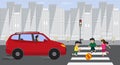 Kids crossing road with red car on red traffic light. Royalty Free Stock Photo