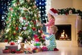 Kids decorating Christmas tree Royalty Free Stock Photo