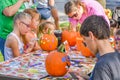 Kids Decorating Pumpkins at Festival Royalty Free Stock Photo