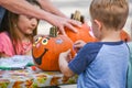 Kids Decorating Pumpkins at Festival Royalty Free Stock Photo