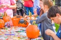 Kids Decorating Pumpkins at Festival Royalty Free Stock Photo