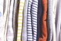 Kids different pattern clothes background. Close-up