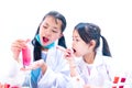 Kids doctor making experiment for learning about Anti Covid-19 measures. Children dream job concept. Royalty Free Stock Photo