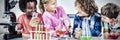 Kids doing a chemical experiment in laboratory Royalty Free Stock Photo