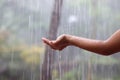 Kids Drizzling hands in rain water Royalty Free Stock Photo