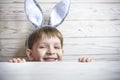 Kids on Easter egg hunt in blooming spring garden. Children searching for colorful eggs in flower meadow. Toddler boy and his brot Royalty Free Stock Photo