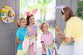 Kids Easter egg hunt. Child and eggs, bunny ears Royalty Free Stock Photo