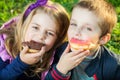 Kids eating donuts