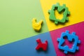 Kids educational developing toys frame on colorful background. Top view. Flat lay. Copy space for text Royalty Free Stock Photo