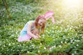 Kids with eggs basket on Easter egg hunt Royalty Free Stock Photo