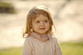 Kids enyoj happy day. Girl with smile on adorable face on natural background