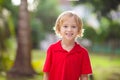 Kids explore nature. Children hike in sunny park