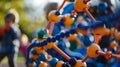 Kids exploring the playground discovering the shapes and structures of molecules Royalty Free Stock Photo