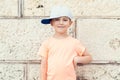 Kids fashion. Lovely little boy in baseball cap. Summer holidays Royalty Free Stock Photo