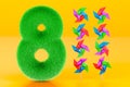 Kids fluffy number 8 with eight pinwheels, 3D rendering