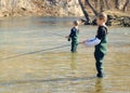 Kids fly fishing Royalty Free Stock Photo