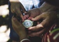 Kids following the directions of a compass Royalty Free Stock Photo