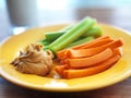 Kids food - peanut butter with celery and carrots. Royalty Free Stock Photo