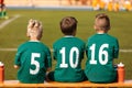 Kids Football Team. Soccer children watching game. Football soccer tournament match for children