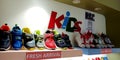 Kids footwear arrangement in showcase at shoes store