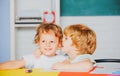 Kids freinds gets ready for school. Funny little children having fun on first time to school.